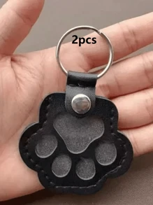 用于存放丢失的宠物毛发的吊坠、用于猫狗的纪念袋、用于存放家人朋友的猫狗毛发的袋子以及带有吊饰的宠物毛发袋