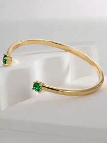 Charm-In Brazalete abierto chapado en oro de 18K con piedra de circonia verde, joyería como regalo de vuelta a clases