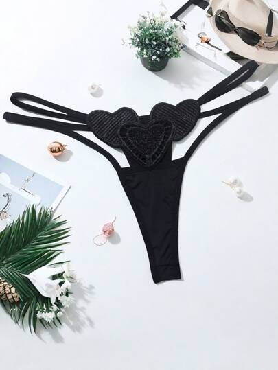 AB. Women's Sexy Lingerie Hollow-Out Ice Silk Thong Panties, Fashionable Heart-Shaped Embroidered Erotic T-Pants, Low-Waist Panties With Heart Design. The Icy Touch Flows Like Spring Water, Comfortable And Cool. The Hollow-Out Design Adds A Touch Of Mystery. The Fashionable Heart-Shaped Embroidery Perfectly Combines Sexiness. The Low-Waist Thong Style Hugs The Body, Outlining The Alluring Curves, Fully Showcasing The Hot And Charming Style. Whether You're Enjoying A Lazy Time At Home Or In A Special Moment, This Heart-Shaped Panty Can Make You Irresistibly Attractive. If You're Pursuing Uniqueness And Charm, Don't Miss This Panty.