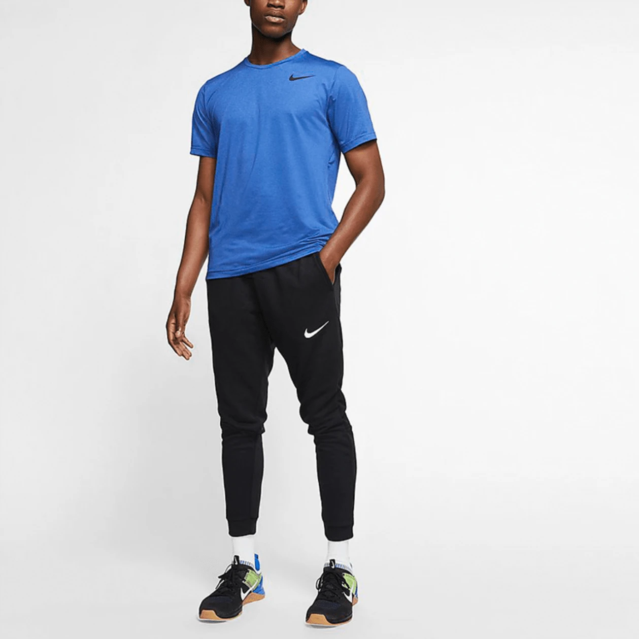 Pantalón de entrenamiento holgado con puños elásticos y estampado del logotipo de Nike para hombre - CJ4313-010 - Negro - Ver 1