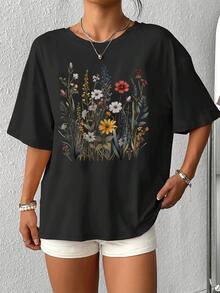 Elegante camiseta de mujer con estampado floral vibrante, camiseta informal de manga corta con cuello redondo, elegante diseño gráfico para uso diario, cómoda y de moda. - Negro - Ver 4
