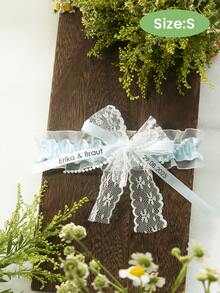 定制复古蕾丝婚纱吊袜带，可刻上姓名和日期，个性化定制，白色/粉色/蓝色荷叶边新娘纪念品，定制文字丝带吊袜带配仿珍珠蝴蝶结，个性化结婚礼物，简约弹力新娘吊袜带，定制日期婚纱吊袜带装饰，经典新娘风格，时尚而富有意义的定制吊袜带，永恒的爱 - 彩色 - 查看 15