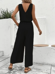 Damen Urlaubs-Jumpsuit mit einfarbigem Knopfdesign, Taillenbindung, V-Ausschnitt, weitem Bein und ärmellos, lässig