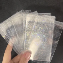 Vorinclex 100张65x90mm全息箔卡套，星形/心形/石英图案，彩虹闪粉，可重复密封，适用于偶像照片、OPCG/PTCG/集换式卡牌、珠宝/收藏照片袋，透明/蓝色单面卡套，0.09mm厚，高品质 - 彩色 - 查看 8