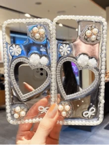 The Heart-Shaped Pearl Mirror Is Suitable For 15promax Phone Cases. 14. The Transparent Case With Resin Coating. 13. Shockproof. 12