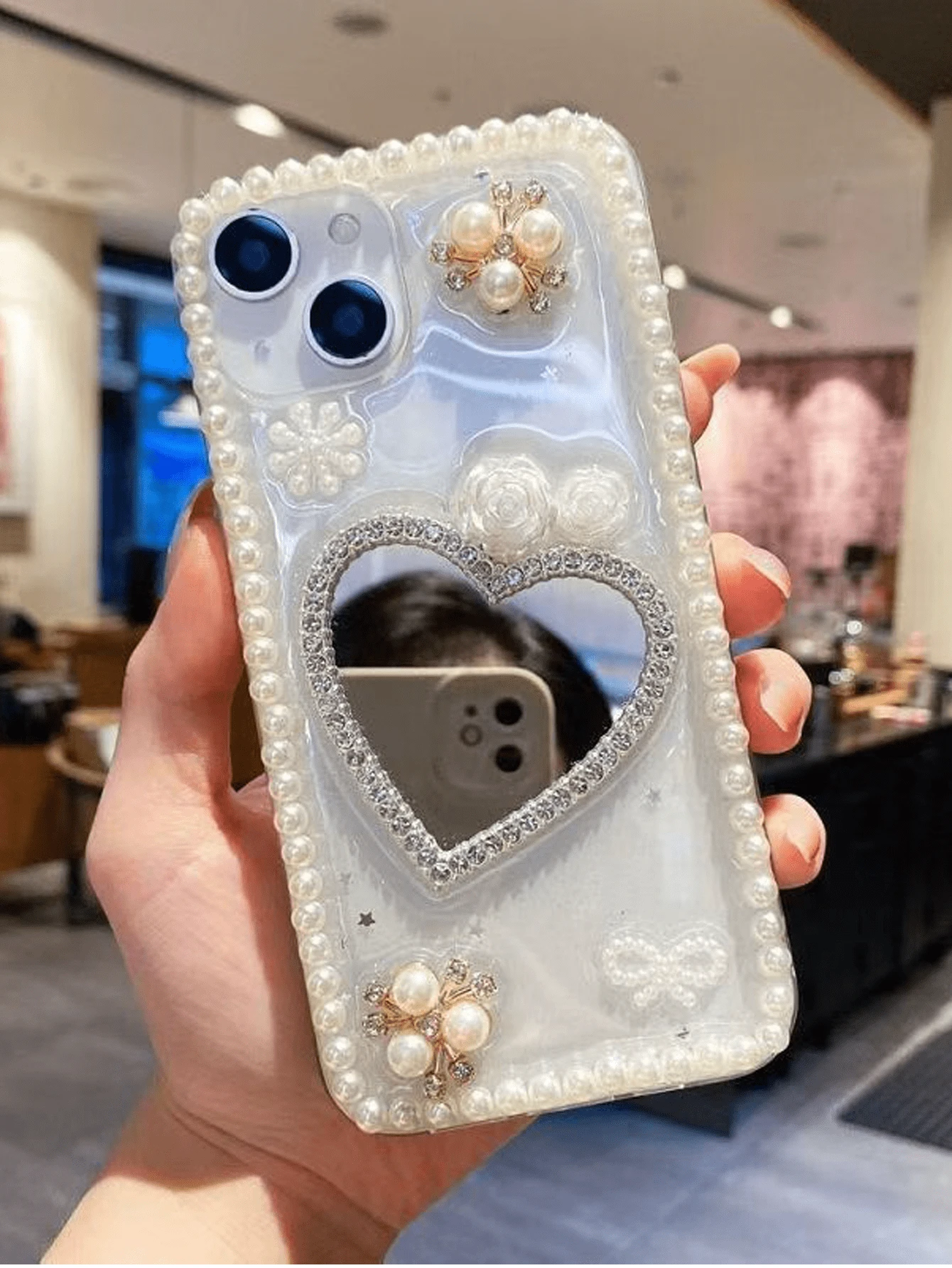 The Heart-Shaped Pearl Mirror Is Suitable For 15promax Phone Cases. 14. The Transparent Case With Resin Coating. 13. Shockproof. 12