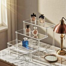 Suport multi-nivel pentru depozitarea cosmeticelor și obiectelor, cu 1 buc., cu configurații cu 5, 4, 3, 2 sau 1 strat, construit din material acrilic transparent. Acest organizator versatil este conceput pentru depozitarea cosmeticelor.