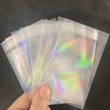 Vorinclex 100张65x90mm全息箔卡套，星形/心形/石英图案，彩虹闪粉，可重复密封，适用于偶像照片、OPCG/PTCG/集换式卡牌、珠宝/收藏照片袋，透明/蓝色单面卡套，0.09mm厚，高品质 - 彩色 - 查看 7
