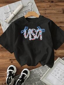Camiseta Casual de Mujer con Estampado Floral Romántico Diseño Moderno y Cómodo con Flores Azules y Rojas para un Estilo Único y Primaveral. - Negro - Ver 1