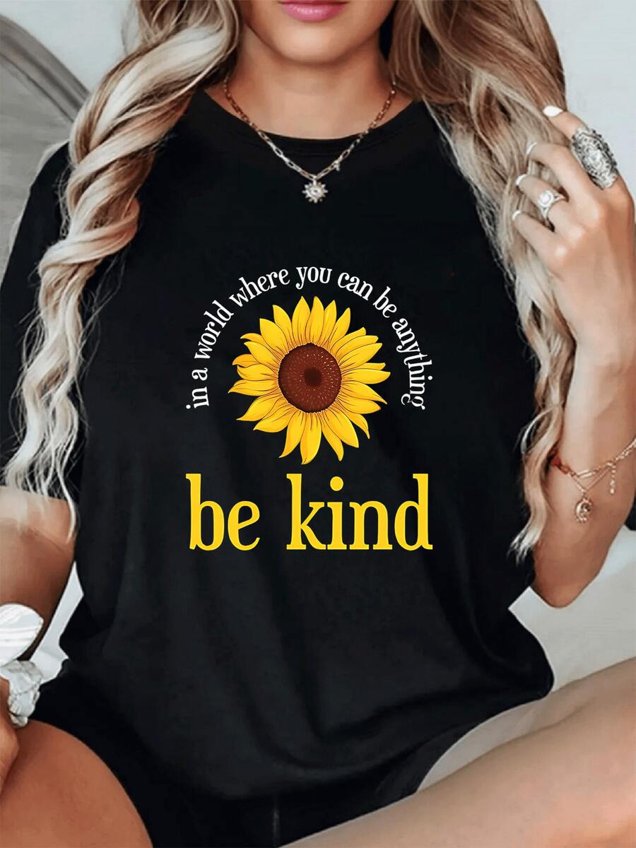 Camiseta de mujer con estampado de girasol y mensaje inspirador.Diseño moderno y cómodo.Ideal para un look casual y con estilo.¡Sé amable! - Negro - Ver 1