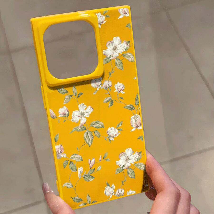 Teléfono con diseño de bloques de flores blancas y hierba verde, adecuado para las series 16 Pro, 16, 15 Pro, 14, 14 Plus, 13, 13 Pro, 12 Pro, 12 Pro. Diseño de cobertura total a prueba de golpes con orificio grande, marco liso brillante y prominente. - Amarillo - Ver 1