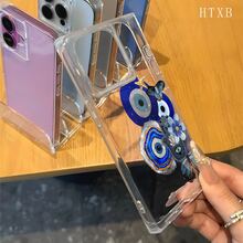 Funda con diseño de bloques y ojos azules. Compatible con los modelos 16 Pro, 16, 15 Pro, 14, 14 Plus, 13, 13 Pro, 12 Pro y 12 Pro. Esta innovadora funda transparente ofrece cobertura total y resistencia a los golpes, además de un diseño muy atractivo. - transparente - Ver 5