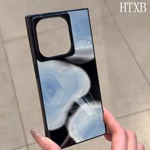Un teléfono con un diseño de bloque de pigmento azul, compatible con los modelos 16 Pro, 16, 15 Pro, 14, 14 Plus, 13, 13 Pro, 12 Pro y 12 Pro. Ofrece una cobertura completa a prueba de golpes, un corte grande, un marco elegante y brillante y mejorado. - Negro - Ver 6