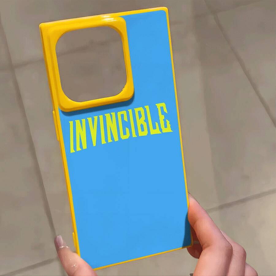 Un teléfono con un diseño de letras azules y un patrón de bloques, compatible con los modelos 16 Pro, 16, 15 Pro, 14, 14 Plus, 13, 13 Pro, 12 Pro y 12 Pro, ofrece una cobertura completa a prueba de golpes con una gran apertura, un marco elegante y brillante y un diseño mejorado. - Amarillo - Ver 1