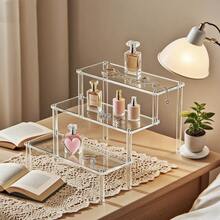 Un raft de depozitare cu 5/4/3/2/1 nivel. Fabricat din acrilic transparent. Potrivit pentru depozitarea cosmeticelor/rujurilor/bijuteriilor/jucăriilor mici/ochelarilor/ceasurilor/prăjiturelor și deserturilor etc. Ideal pentru decorul camerei, decorul casei și organizare.