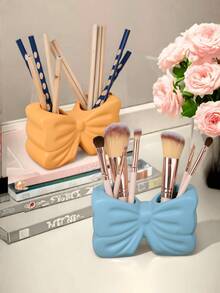 1 pieza Estante de almacenamiento de cosméticos con forma de lazo estilo nórdico, estante de almacenamiento de cepillos de dientes, decorativo para escritorio en el hogar, decoración estética para la habitación, decoración del hogar, ahorro de espacio, accesorios para cocina, baño, dormitorio, para vacaciones, playa, colección de baño, colección de dormitorio, gran capacidad