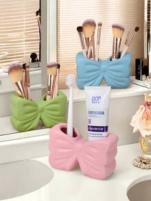 1 pieza Estante de almacenamiento de cosméticos con forma de lazo estilo nórdico, estante de almacenamiento de cepillos de dientes, decorativo para escritorio en el hogar, decoración estética para la habitación, decoración del hogar, ahorro de espacio, accesorios para cocina, baño, dormitorio, para vacaciones, playa, colección de baño, colección de dormitorio, gran capacidad