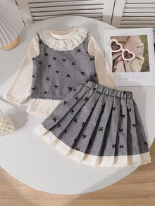 Conjunto de moda para niñas pequeñas de 3 piezas: Camiseta de cuello alto + Chaleco con ribete de encaje + Falda plisada con ribete de encaje