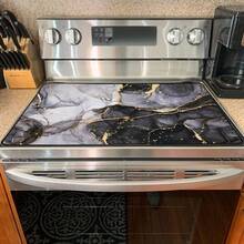 1 片 20.5*28.5 英寸电炉垫，燃气灶台面保护垫，耐热、防刮、高吸水性、防滑、易清洁，保护电炉、电磁炉、陶瓷炉灶台面。