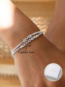 轻奢埃及风格，简约不锈钢定制手链，可定制英文姓名、日期、数字，适用于情人节、派对、宴会、周年纪念日、生日等场合。高品质珠宝配饰，是送给女性的理想礼物。金色、时尚、多彩、复古、潮人、简约、千禧年代、2000年代时尚、定制、个性化、独特。送给他的理想礼物，送给她、男朋友、女朋友、爸爸、妈妈、家人、朋友，适用于周年纪念日、生日、毕业典礼、舞会、派对等场合。定制时尚文字手链，复古装扮，新年魅力。 - 金黃色 - 查看 1