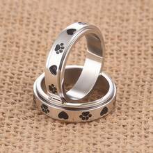 1pc Cute Pet Paw Print Rotatable Stainless Steel Fidget Ring, Fashion Animal Paw Print Spin Ring Jewelry, Decoration For Anxiety Relief