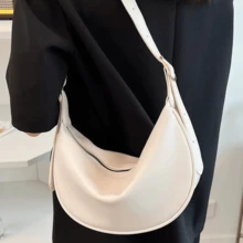 Bolsa a tiracolo de sela, casual e versátil, de design de nicho minimalista em cor sólida com zíper, de grande capacidade, ideal para transporte, modelo baguete