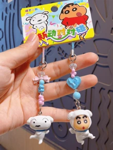 Mini llavero de Crayon Shin-chan - Edición perrito blanco. Adorable figura 3D con cuentas de colores y lazo. Ideal para decorar bolsos y llaves. Coleccionable de anime único para fans de todas las edades. Accesorio elegante y funcional para uso diario. Regalo ideal para amantes del anime y amantes de la moda. - novato - Ver 3