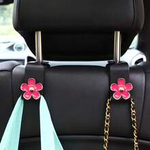 2 piezas Ganchos de crisantemo para asientos de coche, ganchos para almacenamiento y organización del asiento trasero del coche, productos prácticos para el almacenamiento de piezas de automóvil, ganchos - Multicolor - Ver 2