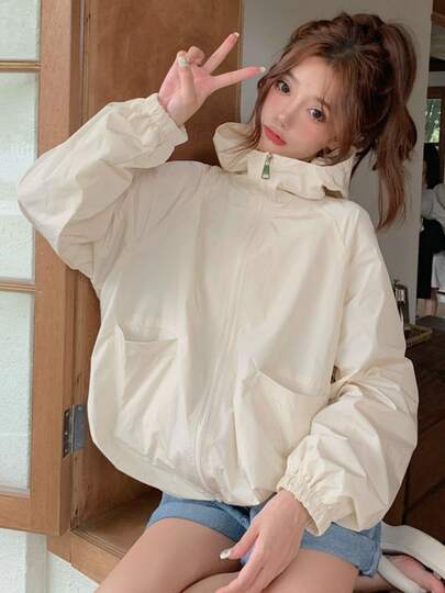 Primavera, verano y otoño con capucha chaqueta corta de los deportes de las mujeres casuales sueltos de color sólido cremallera perforación chaqueta versátil ropa de sol