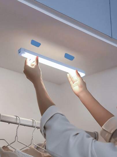1piece Of White Led Light Strip With Motion Sensor - Perfect For Cabinets, Wardrobes, And Corridors. The Led Light Strip With Wireless Motion Sensor Below The Cabinet Is A Rechargeable Magnetic Night Light For Corridors, Kitchens, Cabinets, Wardrobes, And Home Decor