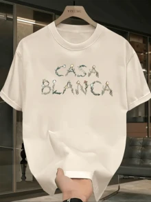 Women's Light Mint Green Casual Short Sleeve T-Shirt - Casa Blanca Lettering Print with Floral Decoration, Crew Neck Summer T-Shirt, Suitable for Casual Dressing and Outdoor Activities, Sports-Friendly Shirt, Durable and Casual - Albaricoque - Ver 1