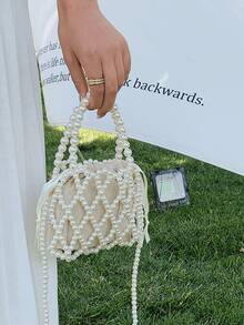 حقيبة يد صغيرة نسائية مصنوعة من خرز الزجاج المنسوج بتصميم مفرغ
