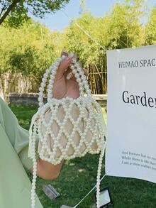 حقيبة يد صغيرة نسائية مصنوعة من خرز الزجاج المنسوج بتصميم مفرغ