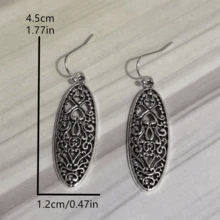 1 par de pendientes con colgante redondo tallado con flores huecas de estilo vintage, adecuados para uso casual, regalo ideal para mujeres en aniversarios, cumpleaños u otras ocasiones