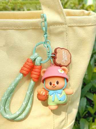 ButterBear Picnic Keychain Charm, Green Rope, Adorable Cartoon Figure Design, Bag & Key Decor, Outdoor Vibes, Gift For Picnic Lovers, Adjustable Cord, Alloy Chain, Backpack Charm, Kawaii Style, Fresh Design, Daily Wear, Gift Ready, Collectible, Limited Edition, Park Days, Casual Chic, Weekend Mood, Cute Carry