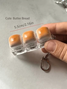 1pc Caramel Bread Shaped Keychain, Stress Relief Fidget Toy, Mechanical Keyboard Switch Tester, Keyring, Desktop Decor, Phone Charm, Creative Novelty Anti-Anxiety Finger Toy