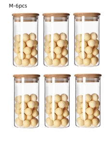 高硼硅玻璃密封储物罐，适用于存放谷物、麦片、干果、柑橘皮和茶叶。直筒圆柱形设计，配竹制盖子，简约透明，是家居收纳的理想之选。