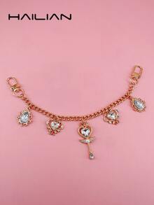 HAILIAN 以美丽少女的魔法棒和水滴宝石为主题设计的合金包包延长链及包包肩带。搭配镶嵌珍珠钻石的魔法棒，象征着智慧与善良，以及交织枝条支撑的心形和闪亮的水滴。可用作包包挂件、延长链、包包肩带，当然也可以作为送给家人、朋友、爱人的小礼物。 - 彩色 - 查看 10