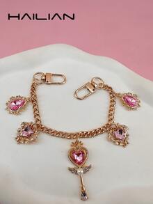 HAILIAN 以美丽少女的魔法棒和水滴宝石为主题设计的合金包包延长链及包包肩带。搭配镶嵌珍珠钻石的魔法棒，象征着智慧与善良，以及交织枝条支撑的心形和闪亮的水滴。可用作包包挂件、延长链、包包肩带，当然也可以作为送给家人、朋友、爱人的小礼物。 - 彩色 - 查看 2