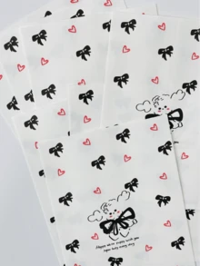 50 pièces Sacs cadeaux en papier de 4,7 x 6,7 pouces, sacs cadeaux avec motif nœud et cœur, sacs cadeaux épais et de qualité supérieure, sacs de rangement pour cadeaux mignons et de dessin animé, sacs cadeaux pour accessoires, convenant pour les sacs cadeaux faits maison, l'emballage de Noël, la Saint-Valentin, les bonbons, les mariages, les anniversaires et les fêtes.