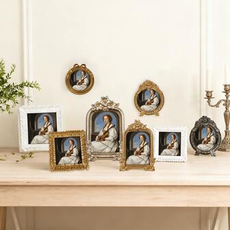 1 件复古树脂相框 | 华丽设计，带有花卉和经典细节的相框 | 适合 4x6/5x7 及更小的照片 | 节日复古设计，适合圣诞装饰 | 适合作为送给家人和朋友的圣诞礼物 | 适合家居装饰、画廊墙壁和复古风格点缀