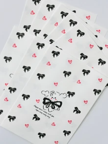 50 pièces Sacs cadeaux en papier de 4,7 x 6,7 pouces, sacs cadeaux avec motif nœud et cœur, sacs cadeaux épais et de qualité supérieure, sacs de rangement pour cadeaux mignons et de dessin animé, sacs cadeaux pour accessoires, convenant pour les sacs cadeaux faits maison, l'emballage de Noël, la Saint-Valentin, les bonbons, les mariages, les anniversaires et les fêtes.