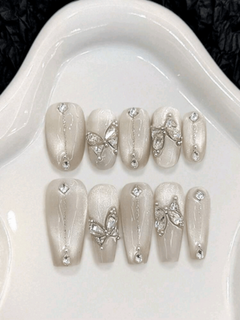 10 piezas de uñas postizas ovaladas/de ataúd medianas largas, hechas a mano con cuentas de mariposa de vidrio, ojo de gato, blanco brillante. Adecuadas para mujeres de diferentes estilos para uso diario y cenas festivas, pueden ser un regalo.