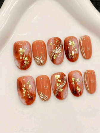 A Set Of 10 Oval-Shaped Japanese Gold Foil Full Coverage Handcrafted Wearable Nail Kits, Featuring A Unique Craftsmanship That Showcases Bold Fashion. Suitable For Parties, Dancing, And Everyday Wear. Comes With A Nail Tool Kit, Making It An Excellent Gift For Women And Girls.