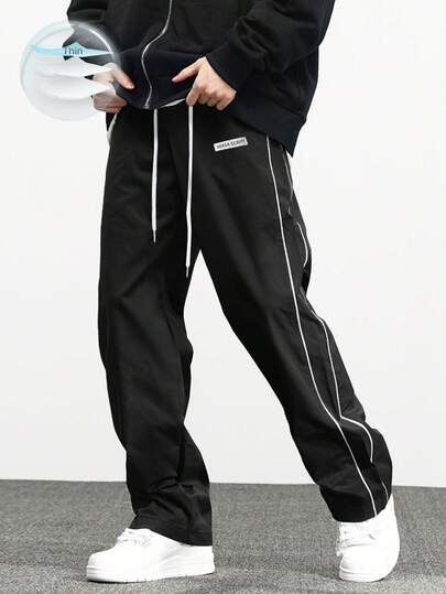 One Pair Of Men's Casual Sport Long Pants, With A Loose Straight-Leg Fit And A Sense Of Drape. They Are Suitable For Both Indoor And Outdoor Activities, And Can Be Used As A Couple's Gift. The Material Is 100% Polyester. It Comes With A Drawstring Waistband For Easy Adjustment, And There Are Various Colors To Choose From.