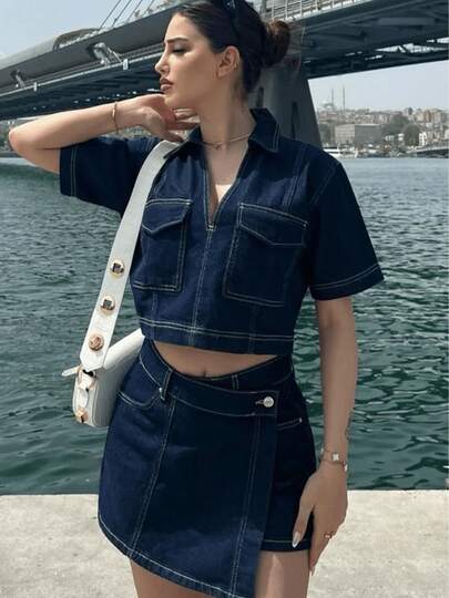 Conjunto de falda vaquera asimétrica y top corto vaquero ajustado de dos piezas para mujer