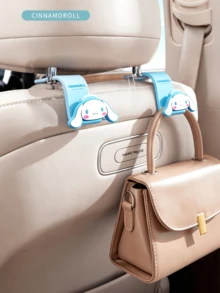 Gancho para asiento trasero de coche Sanrio Cinnamoroll: solución duradera y elegante para colgar en el coche, ajuste universal, ideal para viajes y uso diario, imprescindible para organizar el coche. Gancho para coche Cinnamoroll. - Perro de orejas grandes - Ver 2