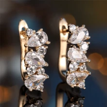 1 par de pendientes de aro elegantes asimétricos con gota de agua y circonita cúbica, pendientes geométricos de moda para mujer