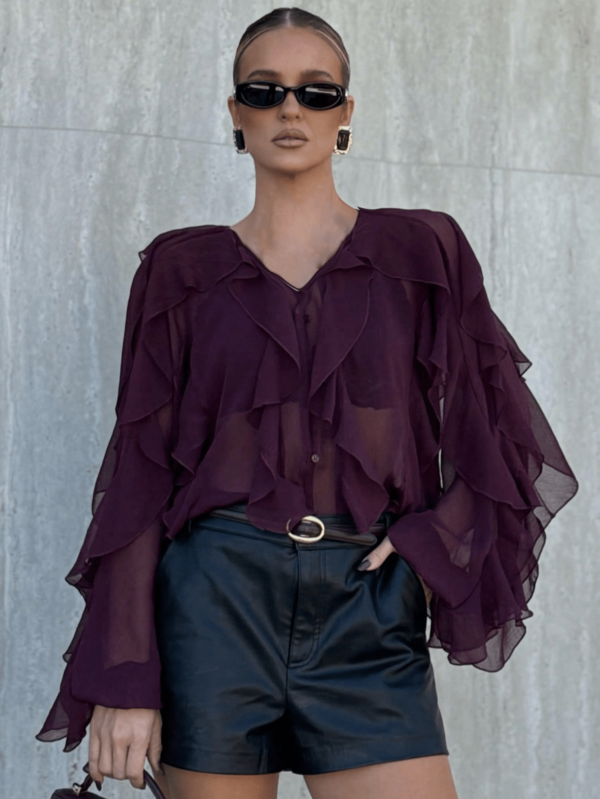 Blusa elegante de primavera 2025 para mujer con cuello en V, abotonadura sencilla, mangas largas y decoración laminada en color sólido