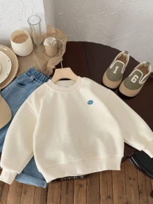 青少年男孩休閒圓領印象衫，春季